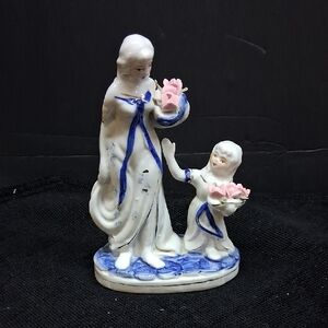 Vintage porcelain figurine of mother & child holding pink flower baskets